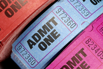Naklejka premium Several rolls of movie theater or concert admit one admission tickets photo
