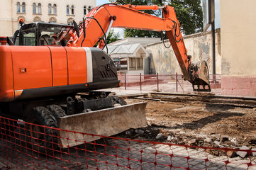 excavator on the street constriction