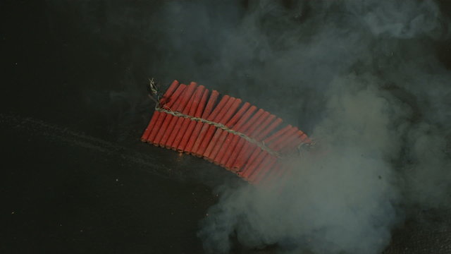 Firecrackers exploding, slow motion