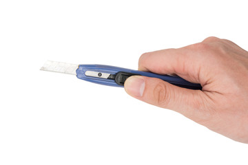 Hand holding cutter knife on white background.