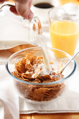 Cornflakes with croissant  for breakfast