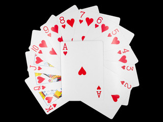 Playing cards isolated on black background.