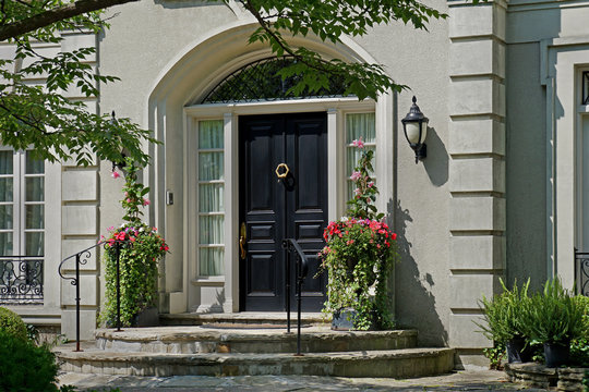 elegant front door with flowers