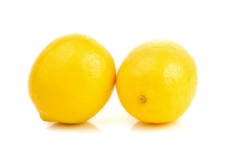 Ripe lemons isolated on white background
