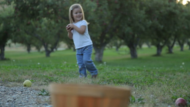 Girl going apple picking