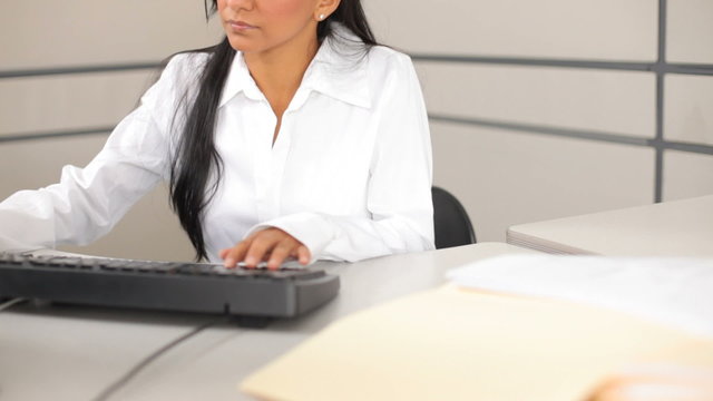Portrait of woman working on computer