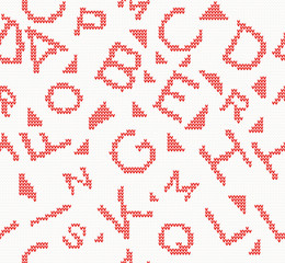 Knitted seamless pattern with letter and triangle.