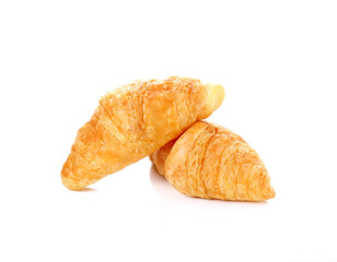 Fresh and tasty croissant over white background