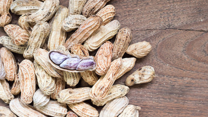 Fototapeta premium Boiled Peanuts on wooden table background.