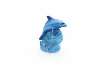 Dolphin/Little dolphin figurine from porcelain on a white background