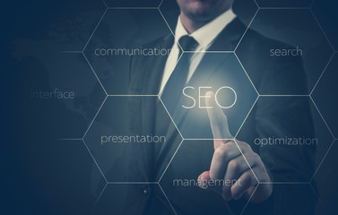 Search optimization business pointing finnger selecting seo