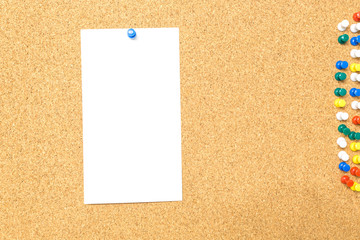 white blank paper on cork board