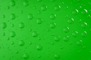 Fototapeta na wymiar water drop on green background
