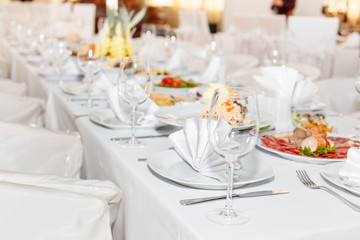 cutlery on the white banquet table