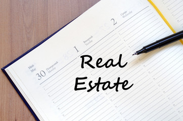 Real estate write on notebook