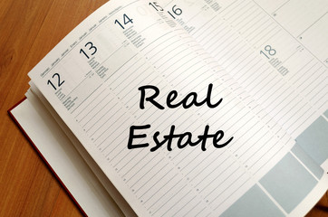 Real estate write on notebook