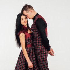 beautiful couple classic costumes in a cage