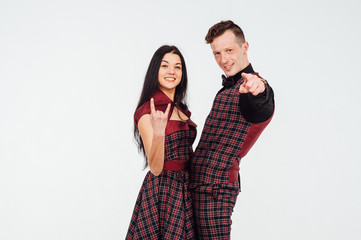 beautiful couple classic costumes in a cage
