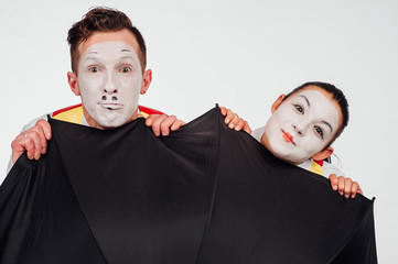  two funny mimes isolated on white background
