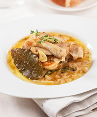 Rabbit with onion sauce