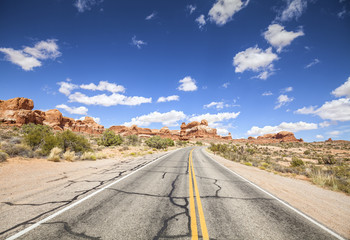 Scenic road with blue sky, Arches National Park, USA