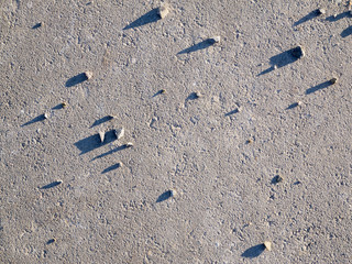 some pebbles on concrete