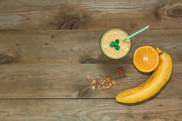fruit smoothies, banana and orange top view