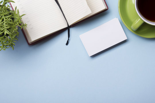 Office Table With Supply And Coffe Cup. View From Above. Copy Space For Text