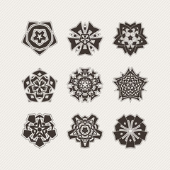Set of ornate vector mandala symbols. Gothic lace tattoo. Celtic weave with sharp corners. 