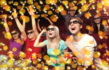 Young people sitting at the cinema, watching a film