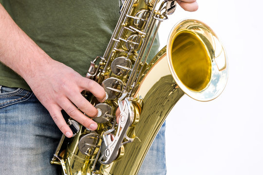 jazzman is playing his saxophone