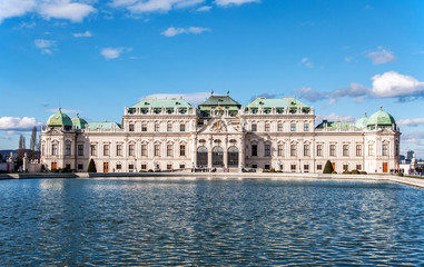 Fototapeta na wymiar Baroque Belvedere palace in Vienna, Austria, with the pond in sunset light