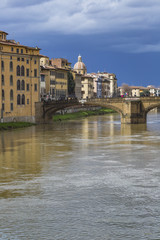 Fototapeta na wymiar FLORENCE, ITALY - MARCH 07: Ponte Santa Trinita bridge over the