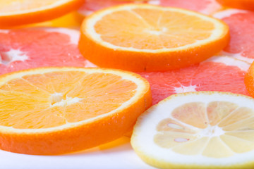 The citrus cut by circles lies on a table