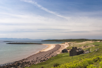 Scotland. Sutherland. May 2009. Red Point beach and fishing station with Skye in the background © espy3008