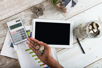 finance concept photo with coins and computer