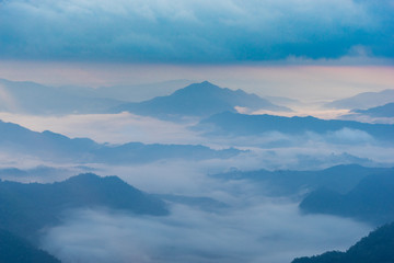 Sunrise scene with the peak of mountain and cloudscape at Phu chi fa in Chiangrai Province,Thailand
