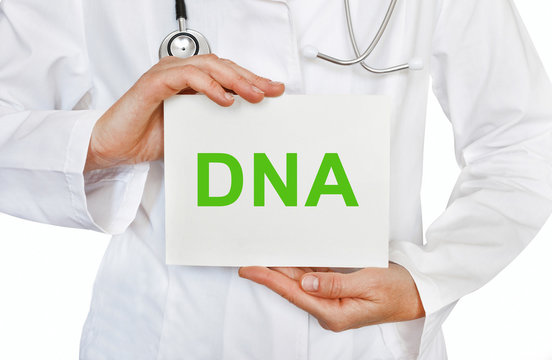 Doctor holding a card with DNA, Medical concept