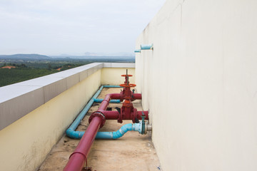 Red valve water connection on industry