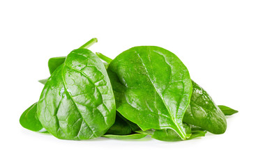 Fresh spinach leaves on a white background