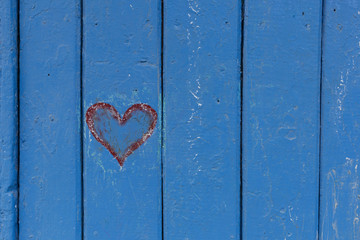 heart painted on a wooden blue door in Chefchaouen