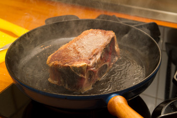 porterhouse steak in a pan