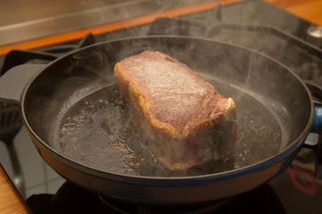 porterhouse steak in a pan