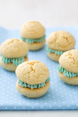 Vanilla whoopie pies with turquoise buttercream filling