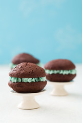 Chocolate whoopie pies with turquoise buttercream filling