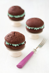 Chocolate whoopie pies with turquoise buttercream filling