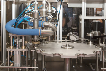 Dairy production. Apparatus for bottling milk products