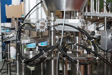 Dairy production. Apparatus for bottling milk products