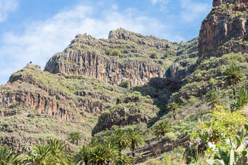 Fototapeta na wymiar Hiking on La Gomera. The Valle Gran Rey, the beautiful canyon on the Canary island La Gomera is located on the west side of the island. Gomera has a unique nature that invites to hike
