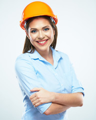 Smiling woman architect standing against white background